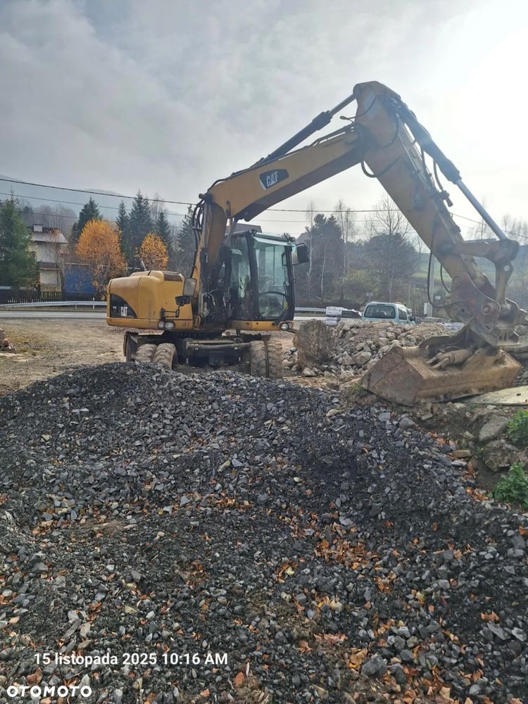 Caterpillar 313D - 3