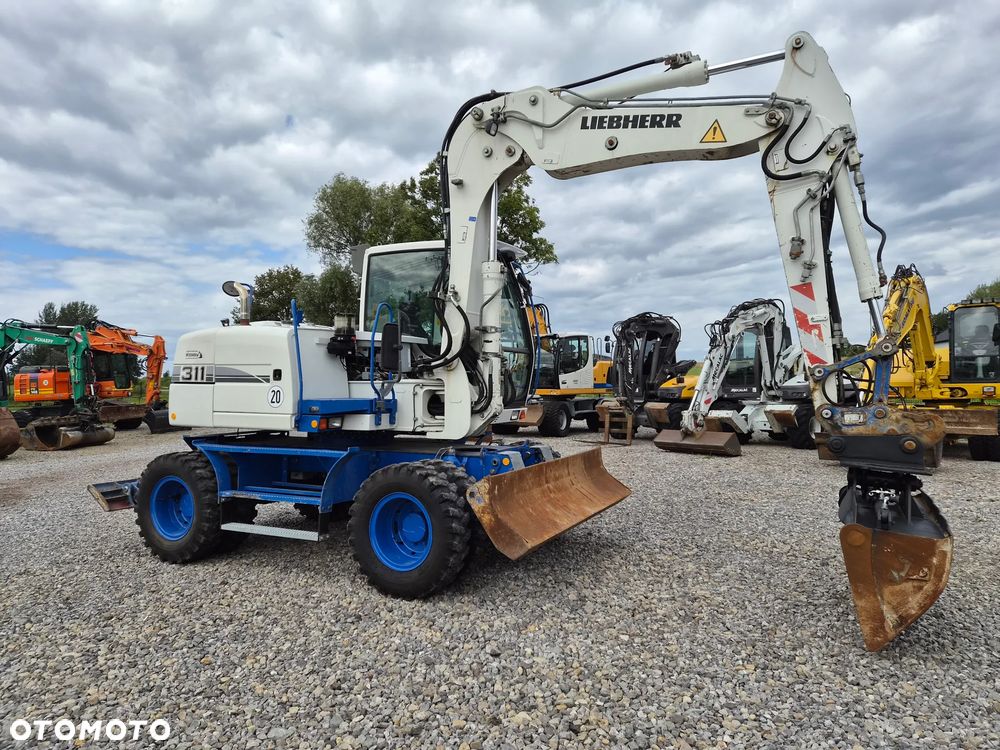 Liebherr A311 litronic - 11