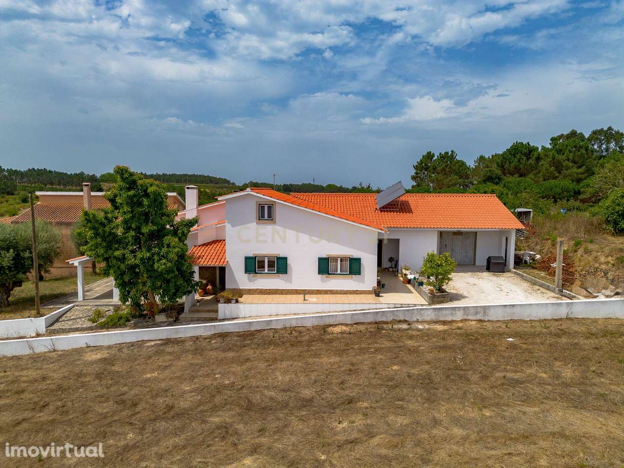 Moradia T3 Térrea - Espaço, Conforto e Localização Privilegiada - Grande imagem: 4/23