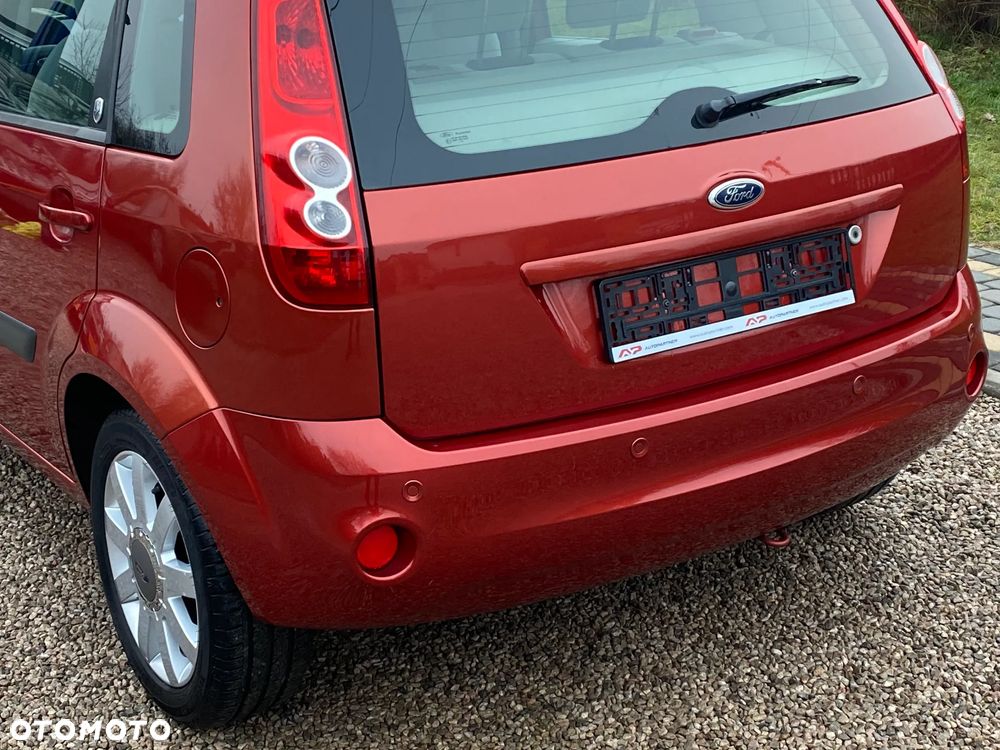 Ford Fiesta 1.4 Ghia - 6