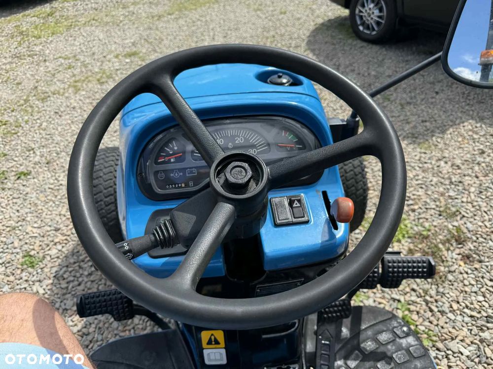 New Holland TC - 12