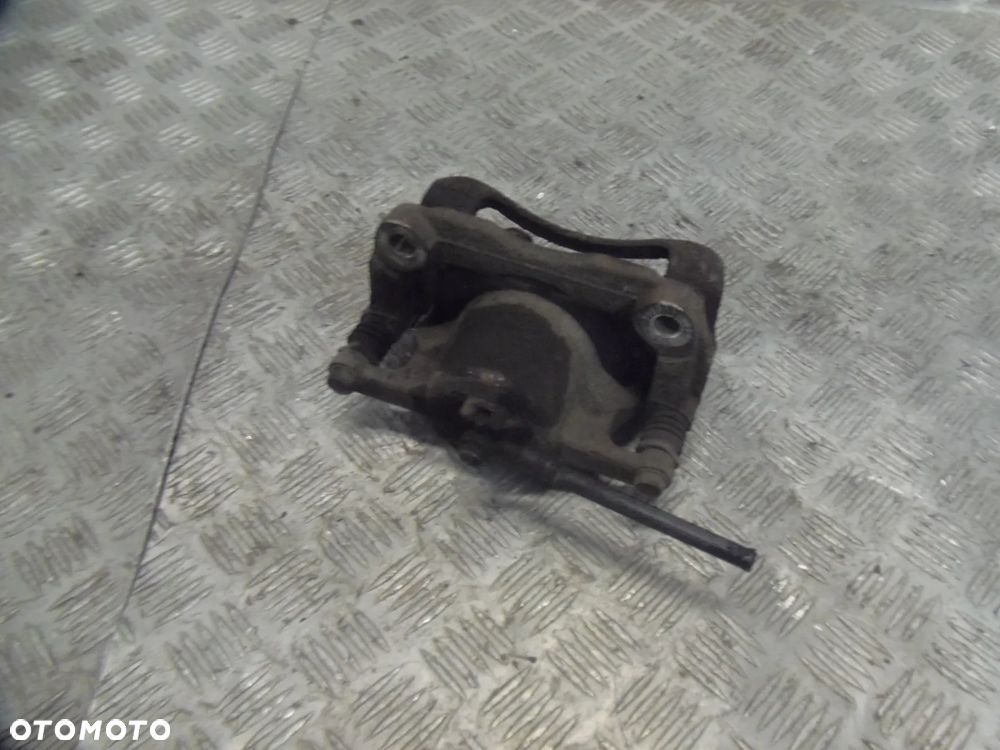 NISSAN QASHQAI J10 LIFT 1.6B 012R ZACISK HAMULCOWY LEWY PRZEDNI PRZÓD - 2