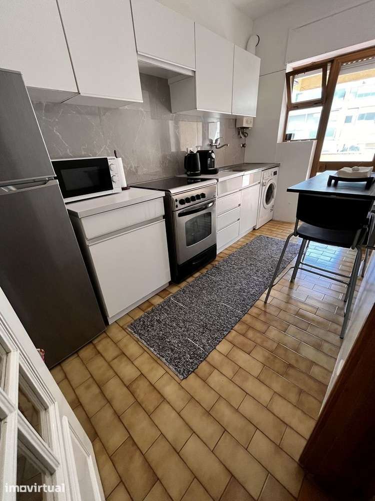 T2 com varanda, terraço e ar condicionado - Grande imagem: 3/6