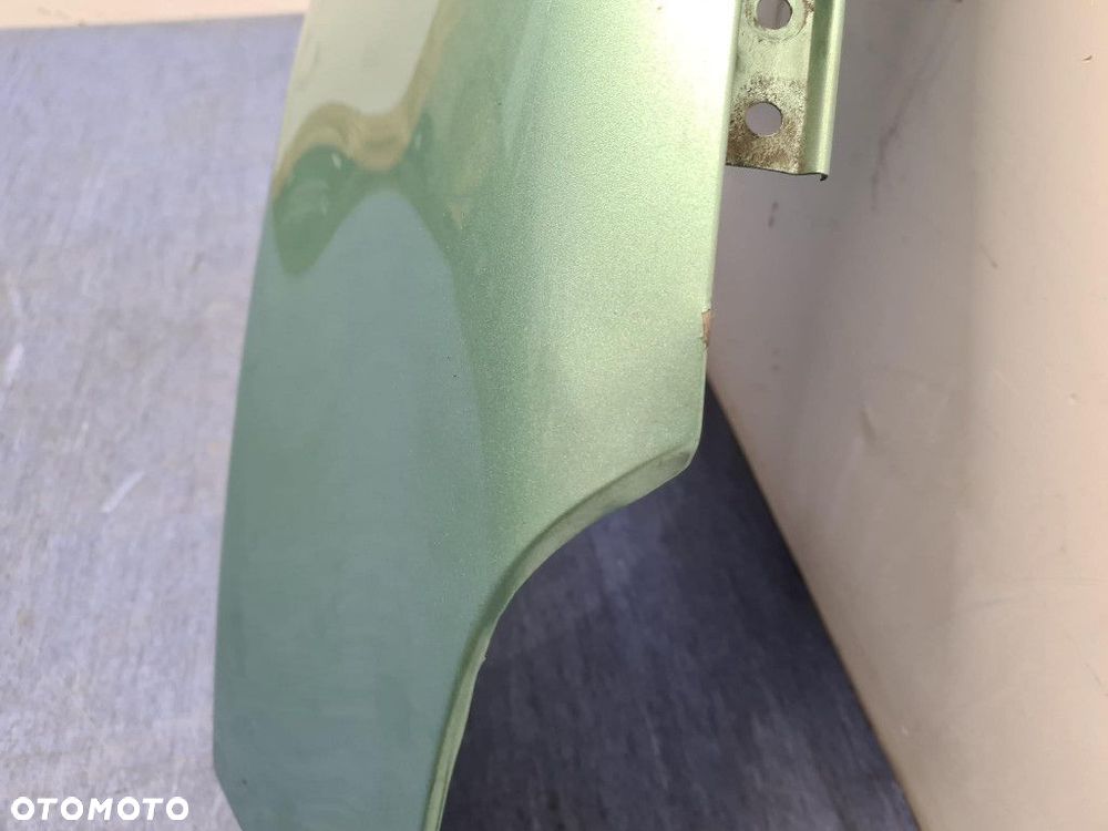 SUZUKI ALTO VII BŁOTNIK PRZÓD PRAWY  ZKZ - 6