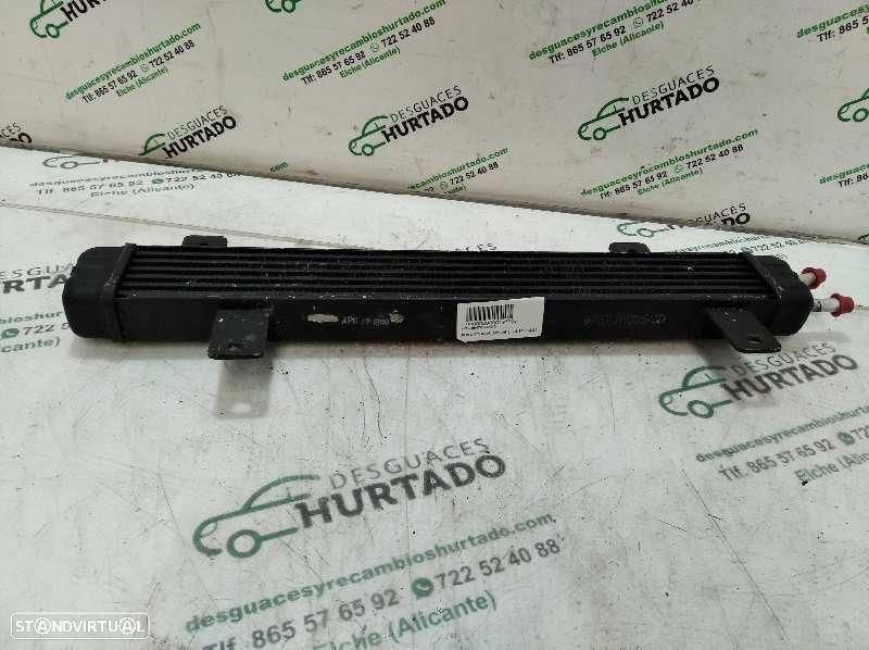 RADIADOR DO ÓLEO FORD COUGAR MC - 1