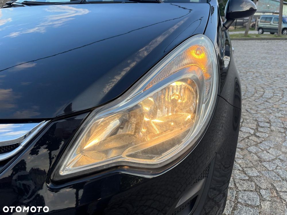 Opel Corsa 1.2 16V Cosmo - 32