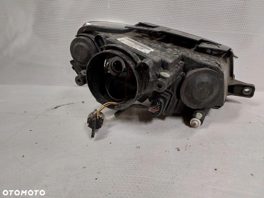 .  LAMPA PRZOD PRZEDNIA LEWA VOLKSWAGEN PASSAT B6 - 3