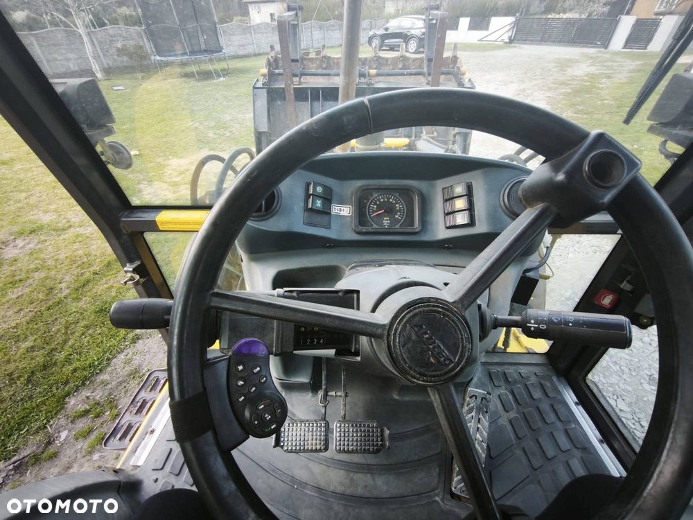 New Holland LB110B - 7