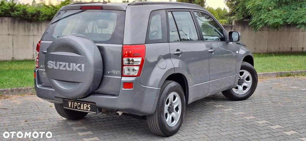 Suzuki Grand Vitara 2.0 Comfort + Family - 11