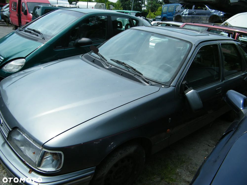 Ford Sierra (91-93r.) 2.0B 115KM. Silnik N9E Skrzynia A4LD lakier Polaris Grey. Cały na części GWARANCJA !!!  Przód Tył Zestaw Komplet Drzwi Klapa Zderzak Błotnik Maska Grill Atrapa Szyba Pas Lampa Lusterko Boczki Fotel Kanapa Kokpit Deska Rozdzielcza Przełącznik Włącznik Sterownik Przewody Wiązka Instalacja Moduł Komputer Czujnik Listwa Pompa Alternator Wtryski Głowica Rozrusznik Kompresor Sprzęgło Dwumas Silnik Skrzynia ABS Klimatyzacji Paliwa Wspomagania Kolektor Turbina Przepustnica Zawór Chłodnica Koło Hak Belka Sanki Zawieszenie Mcpherson Półoś Amortyzator Wydech Tłumik Zacisk Most - 4