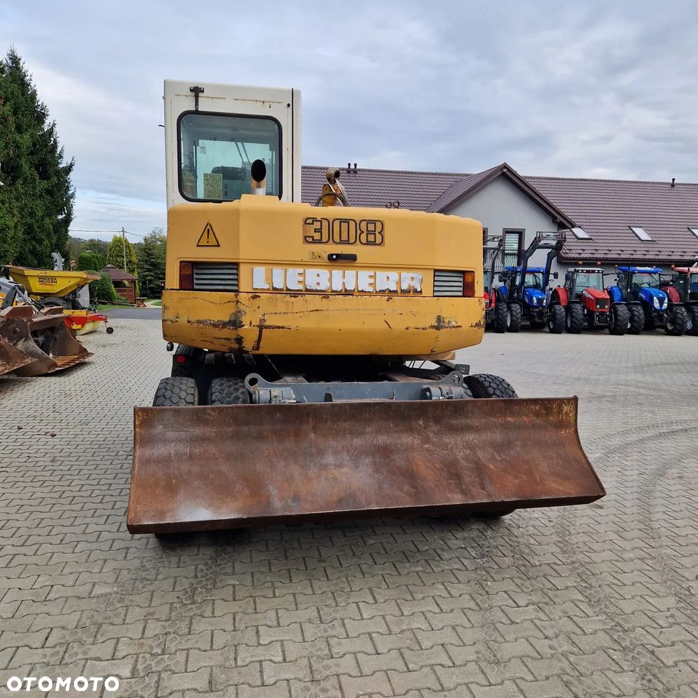 Koparka kołowa pali i jeździ - 6