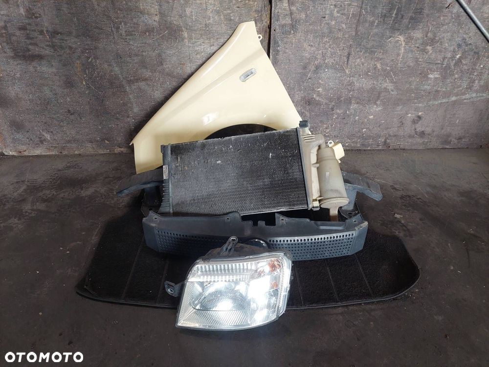 BŁOTNIK LEWY PRZÓD + LAMPA LEWY PRZÓD + CHŁODNICA + GRILL FIAT PANDA II 541 - 1