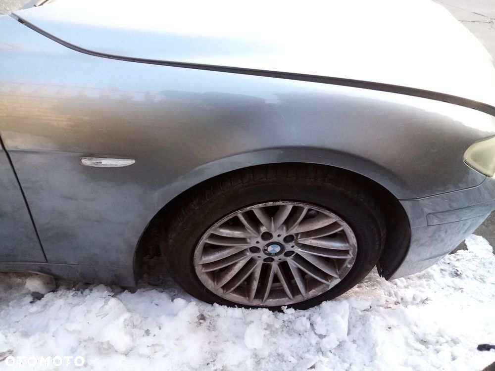 BMW E65 735i 3.6 N62B36A  01 - 05 - BLOTNIK PRZÓD LEWY  472/7 - 28