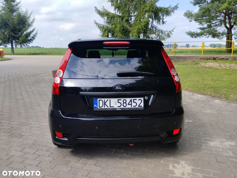 Ford Fiesta 1.4 Ghia - 8