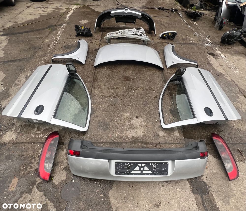 Zderzak przedni Corsa  drzwi prawe lewe przód tył lampy przednie tylne - 6