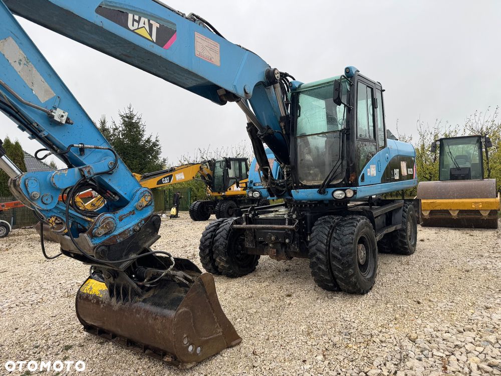 Caterpillar M322D - 1