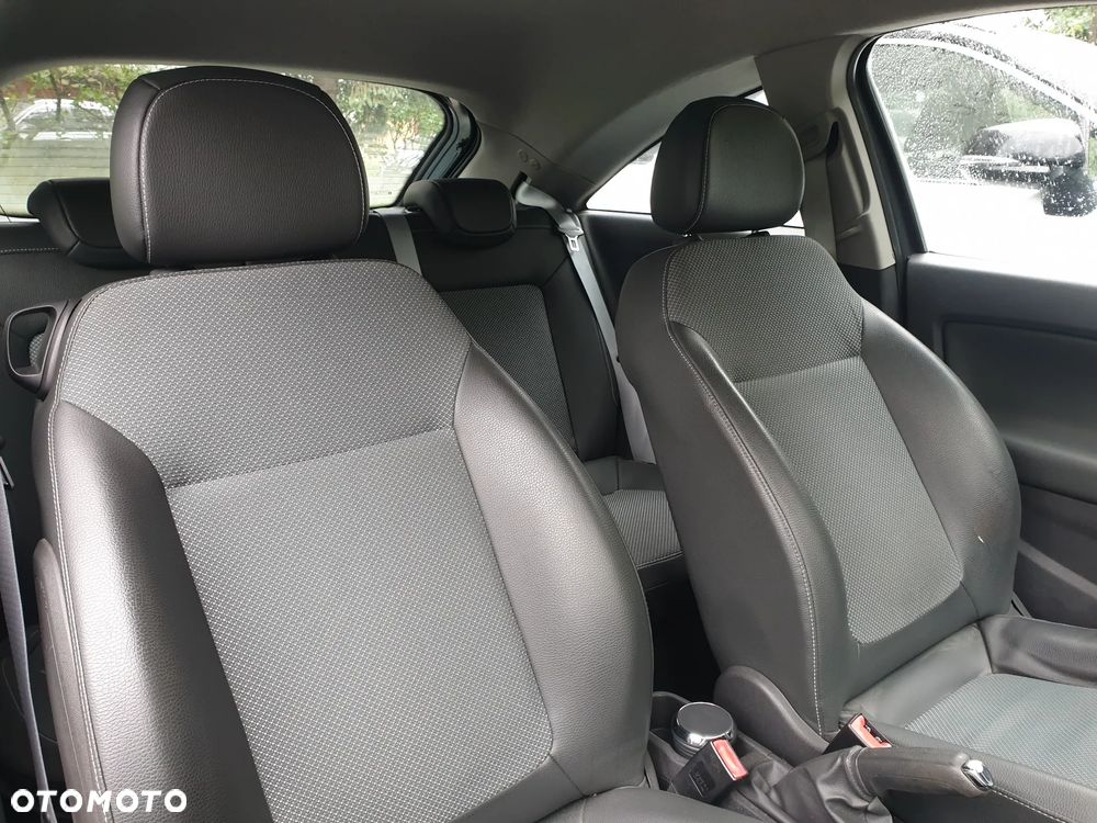 Opel Corsa 1.4 16V Cosmo - 14