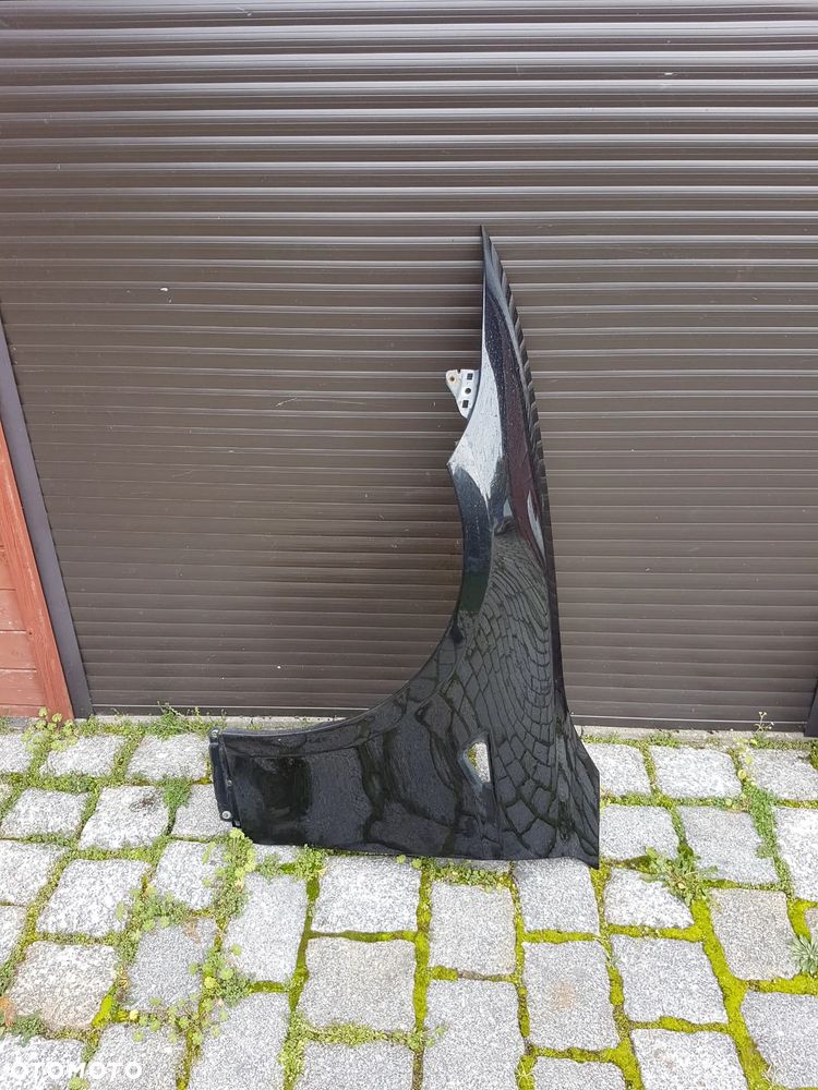 TESLA S PRZEDNI BLOTNIK PRAWY LUB LEWY PRZOD