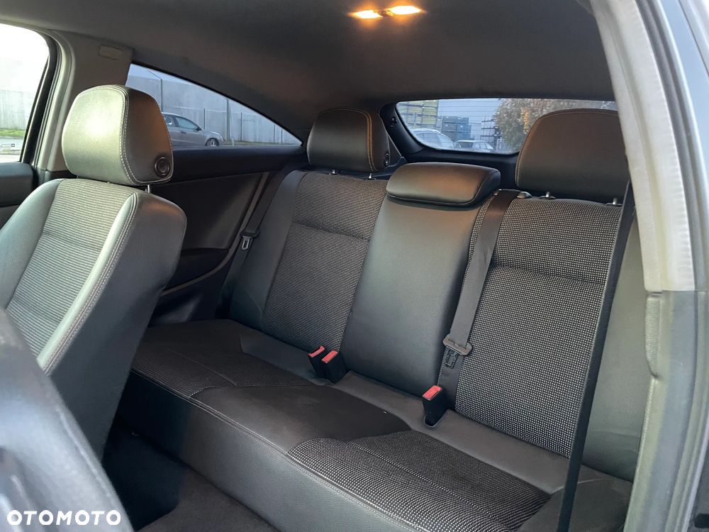 Opel Astra GTC 1.8 - 12