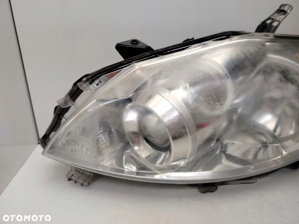 TOYOTA AURIS I LIFT 09R- REFLEKTOR LAMPA LEWY PRZÓD LEWA PRZEDNIA - 2