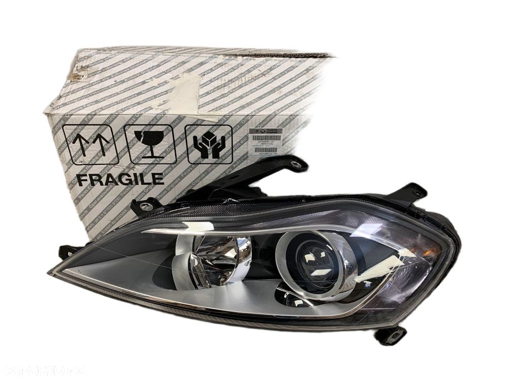 NOWA ORYGINALNA LAMPA LAMPA LEWA PRZEDNIA LEWY PRZÓD LANCIA DELTA 08-14 51876348 - 1