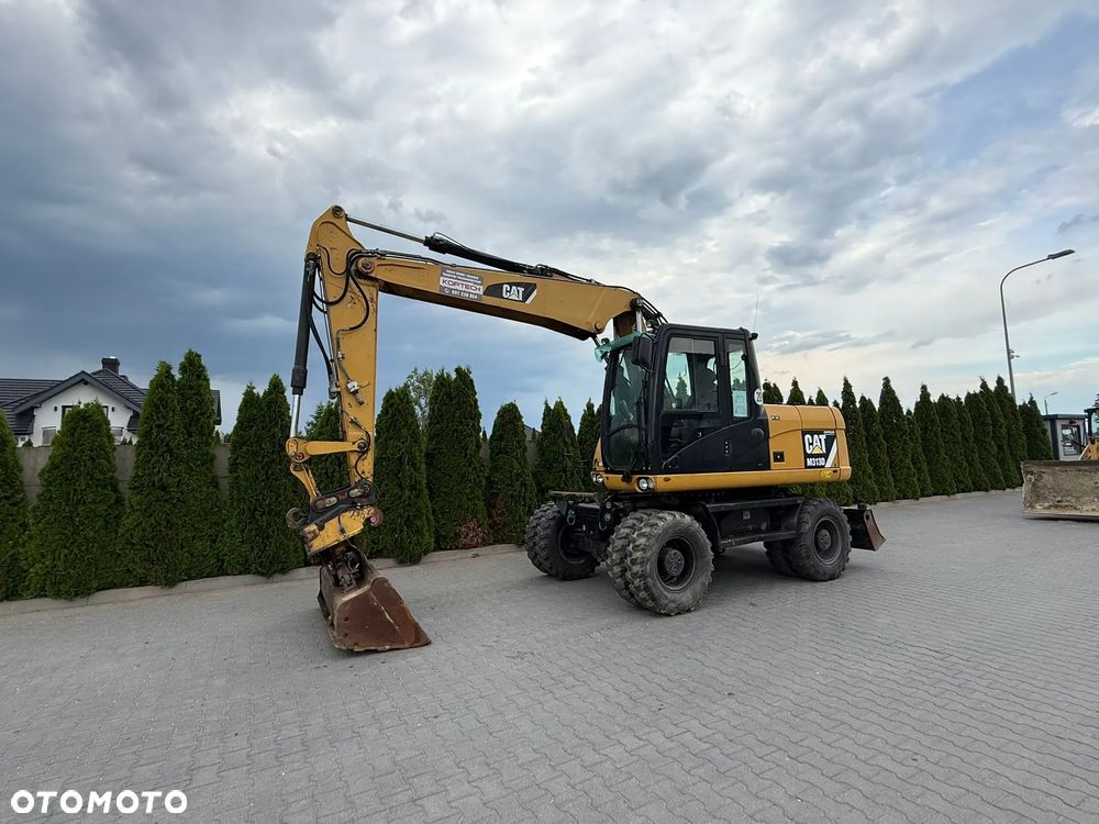 Caterpillar 313 - 1