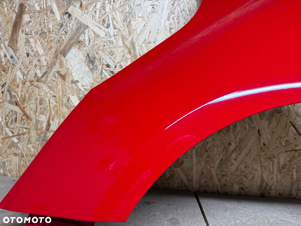 BŁOTNIK LEWY PRZÓD LEWY PRZEDNI OPEL CORSA E CZERWONY 50B - 18