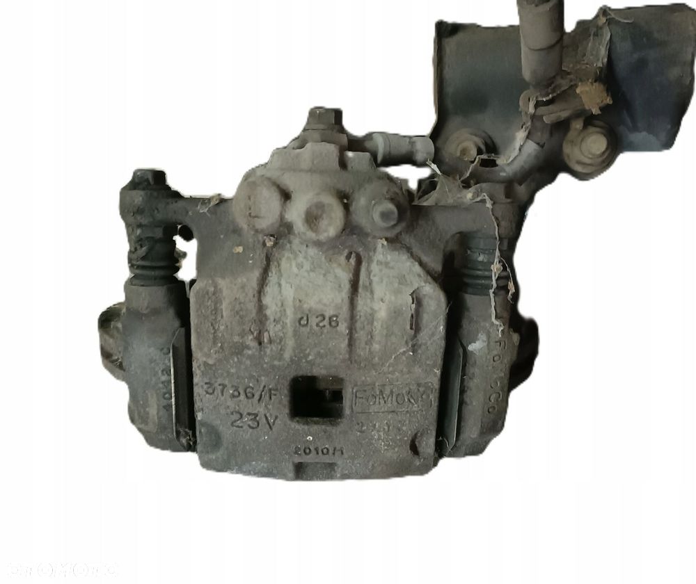 FORD FIESTA MK7 08-17 r. 1,25 B ZACISK HAMULCOWY Z JARZMEM LEWY PRZÓD - 1