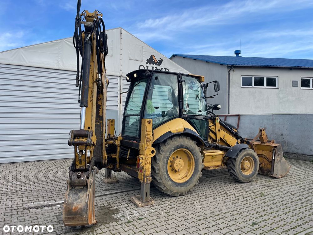 Caterpillar 428E - 7