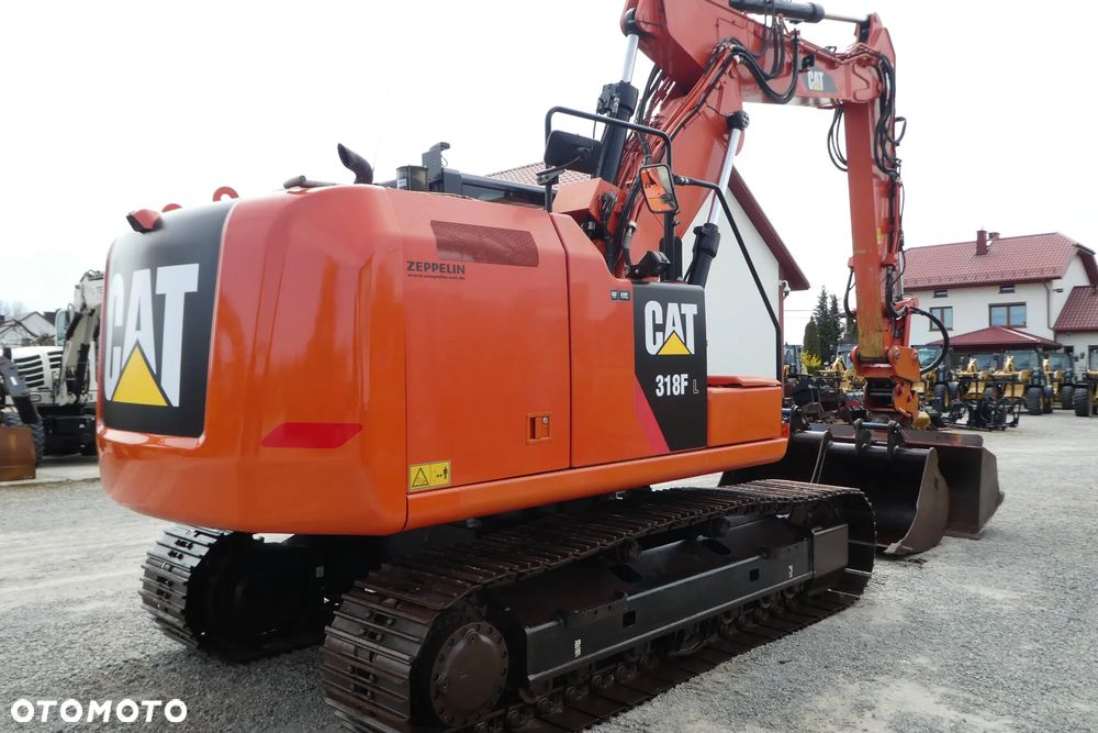 Caterpillar M 318F Z NIEMIEC TRZY ŁYŻKI - 6