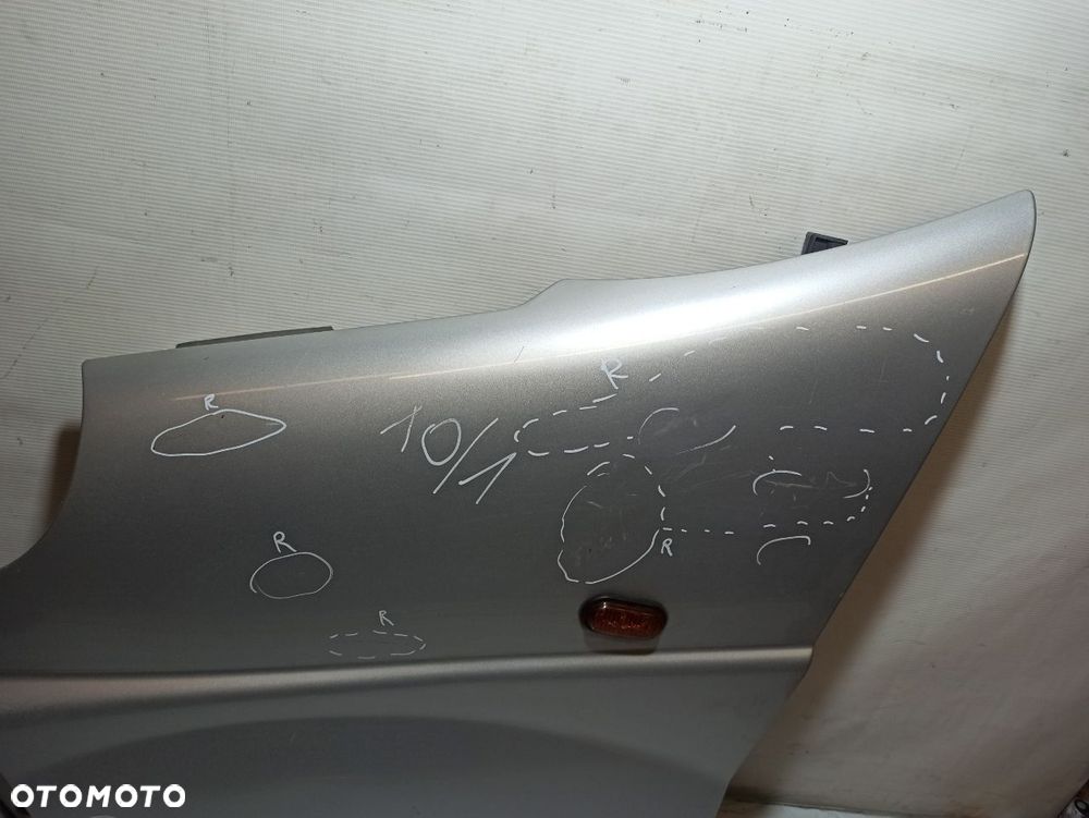 BŁOTNIK LEWY PRZEDNI OPEL VIVARO A - 2