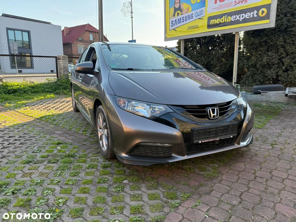 Honda Civic 1.4 i-VTEC Comfort - 1