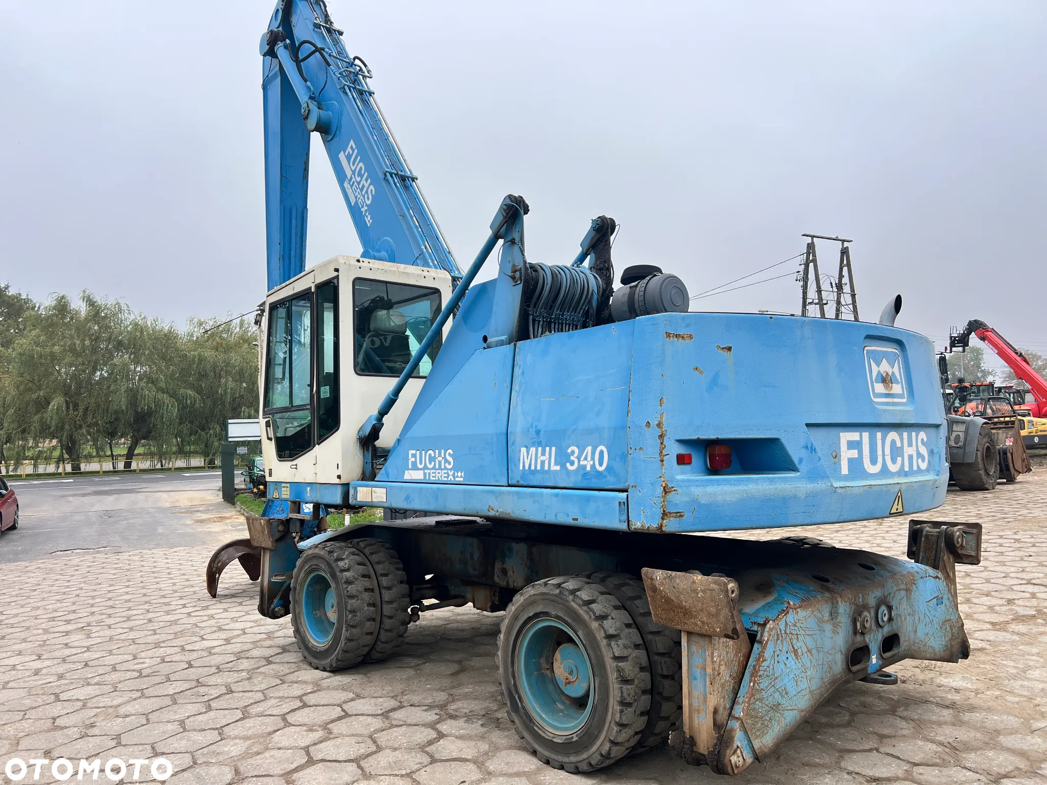 Fuchs MHL340 340 chwytak do złomu FUCHS 0,9m3 - 3
