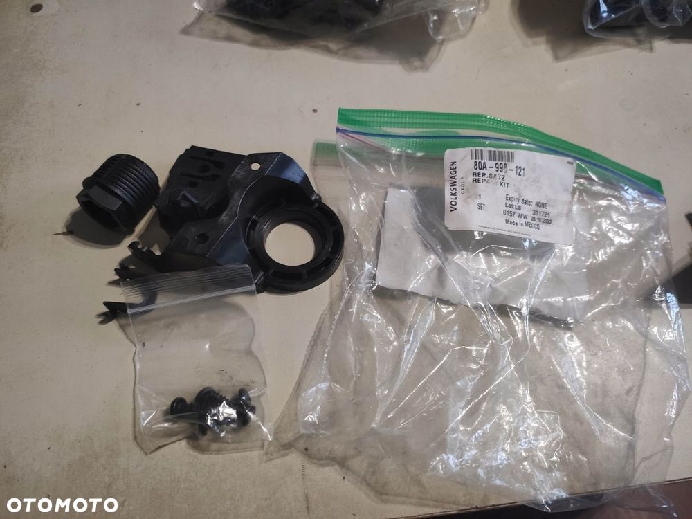 ZESTAW NAPRAWCZY REFLEKTORA LEWEGO USZY AUDI Q5 16- ORG 80A998121 - 1