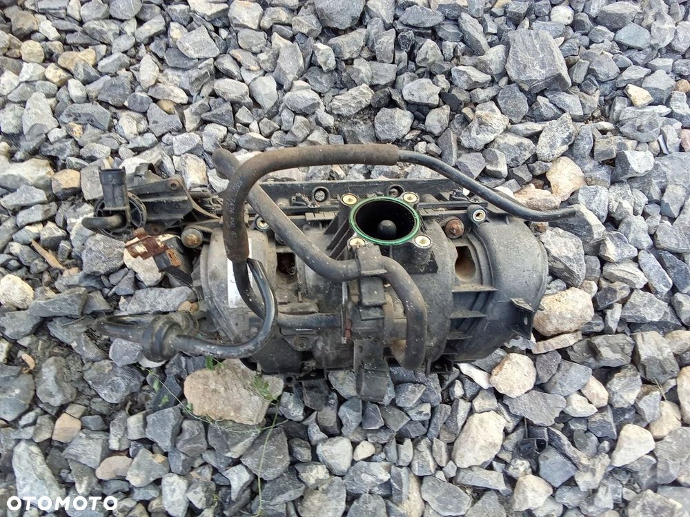 KL KOLEKTOR SSĄCY OPEL CORSA D 06- 1.4 0280600064 - 1