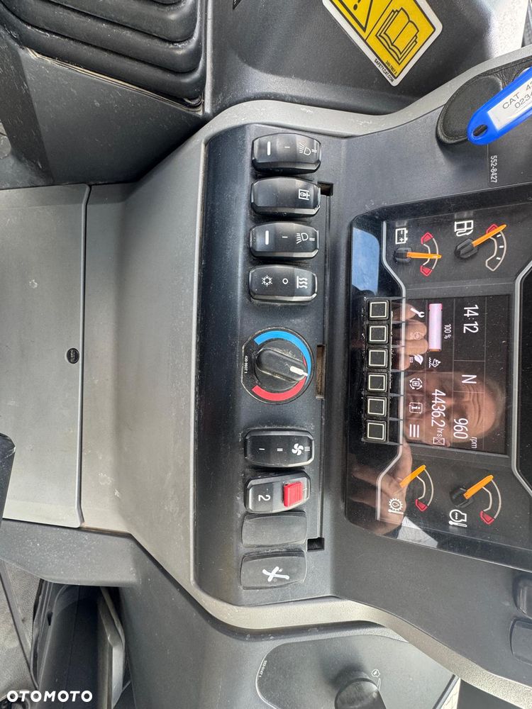 Caterpillar 428 - 35