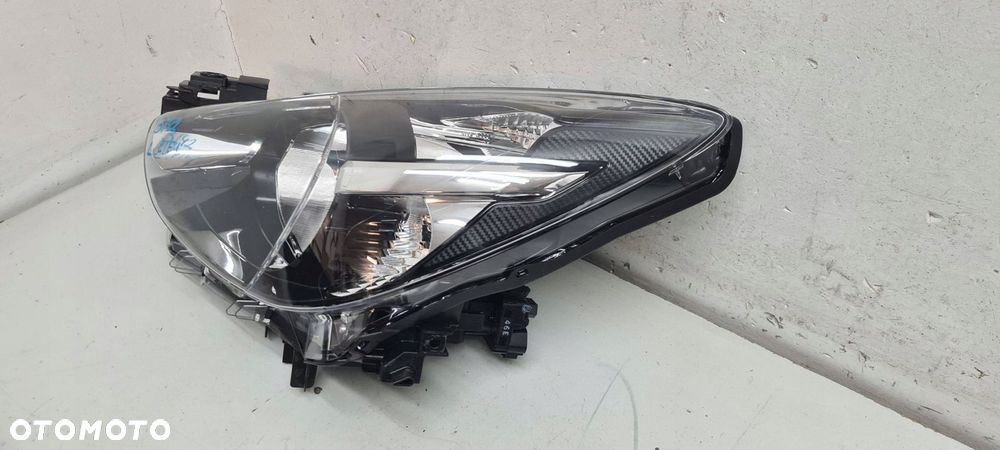 mazda 2 14- lampa reflektor lewy eu ładny - 2
