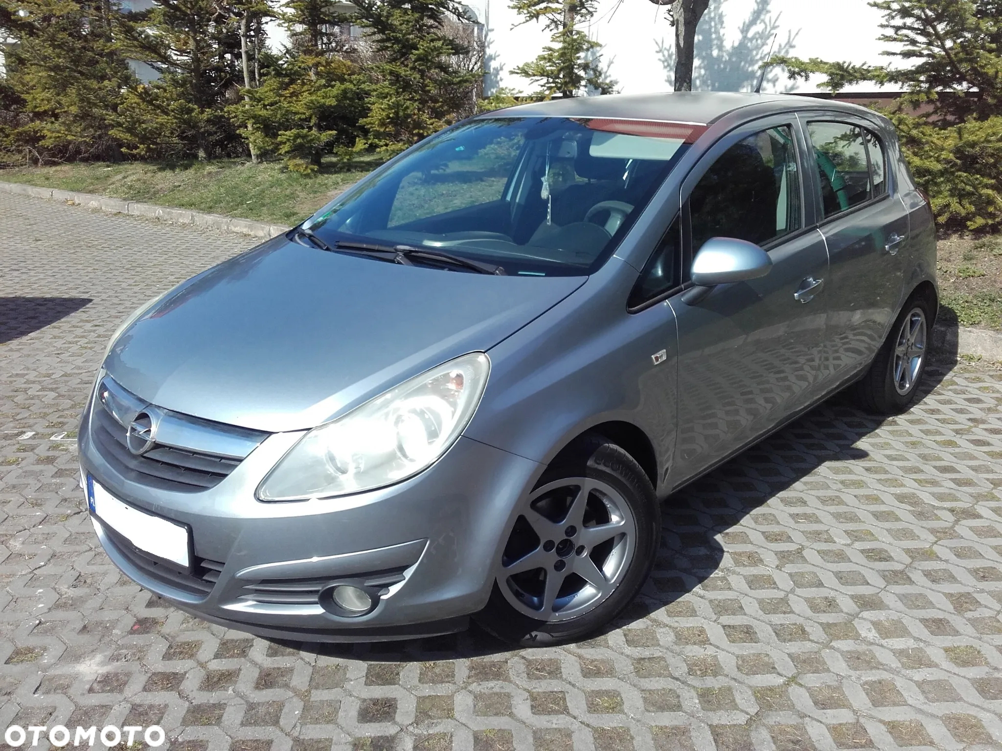 Opel Corsa 1.4 16V Cosmo - 11