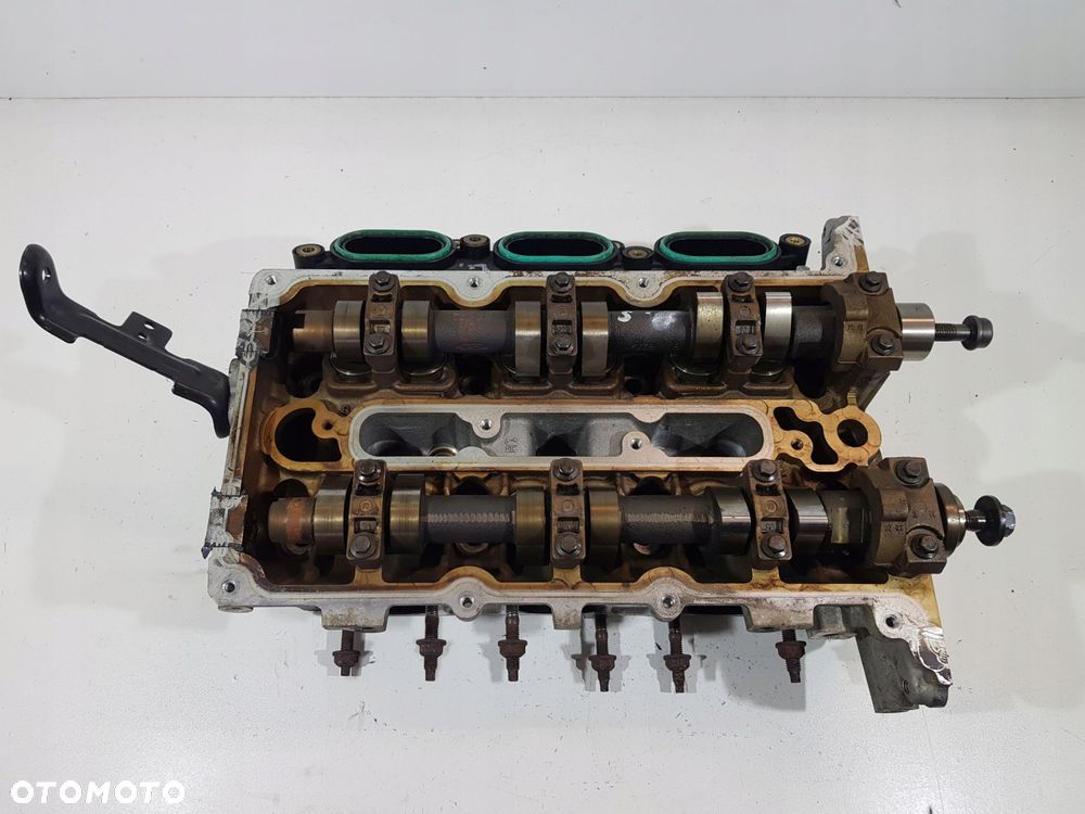 głowica lewa jaguar x-type 2.5b v6 4x4e-6090 - 2