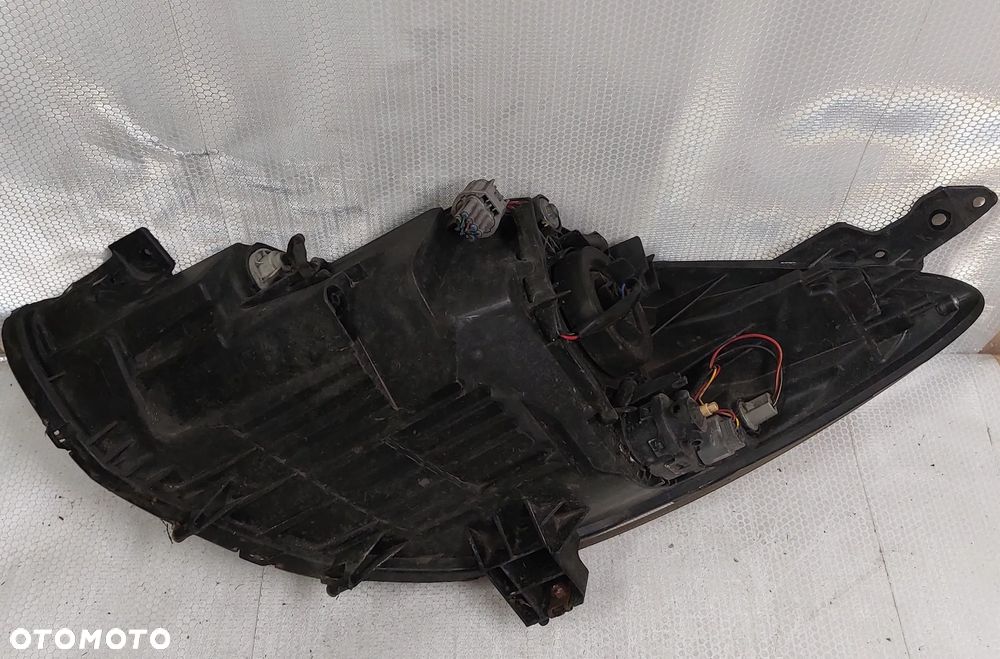 .  LAMPA PRZOD PRZEDNIA PRAWA MAZDA 2 - 4