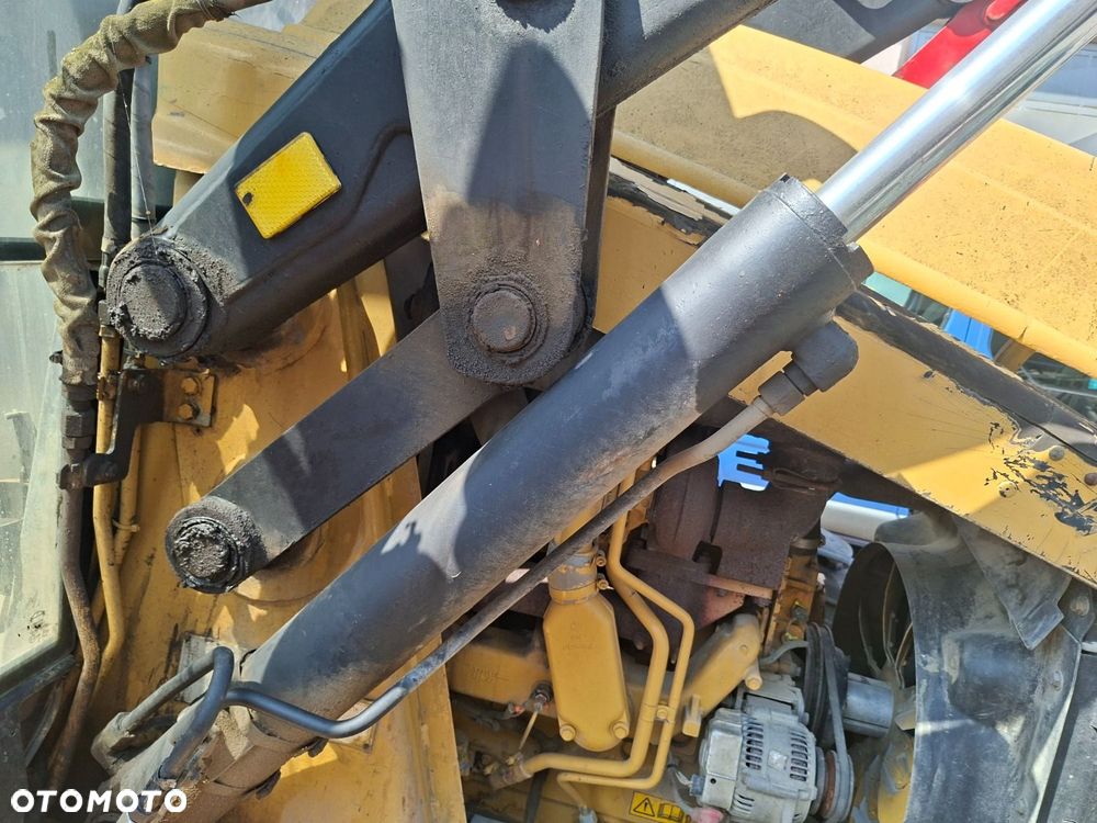Caterpillar 428 C 4X4 - 23