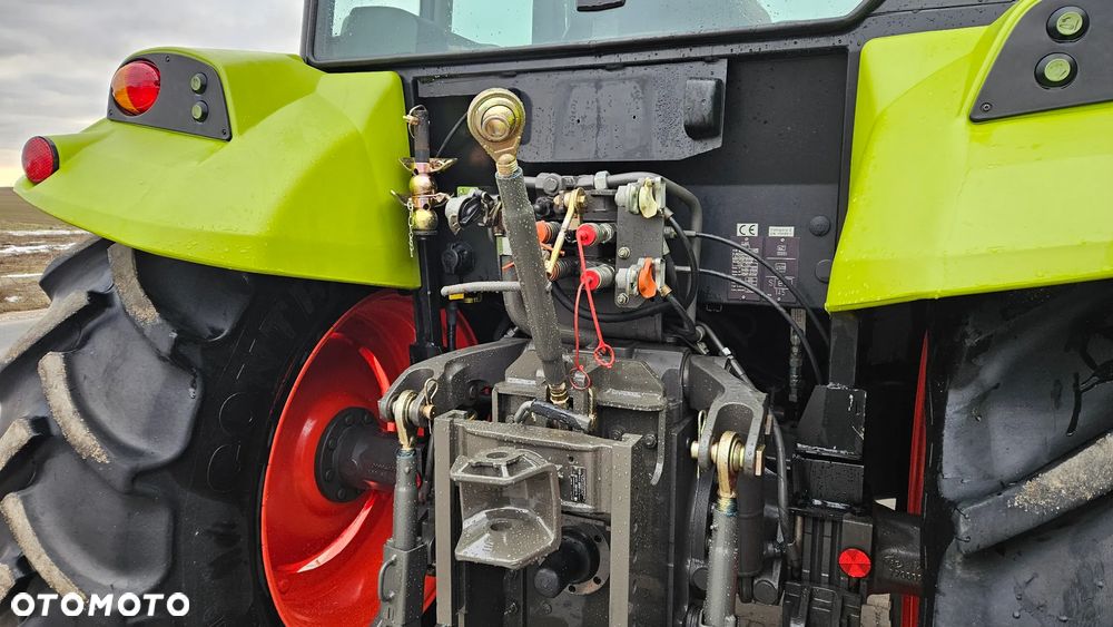 Claas Axos 320 CX - 13