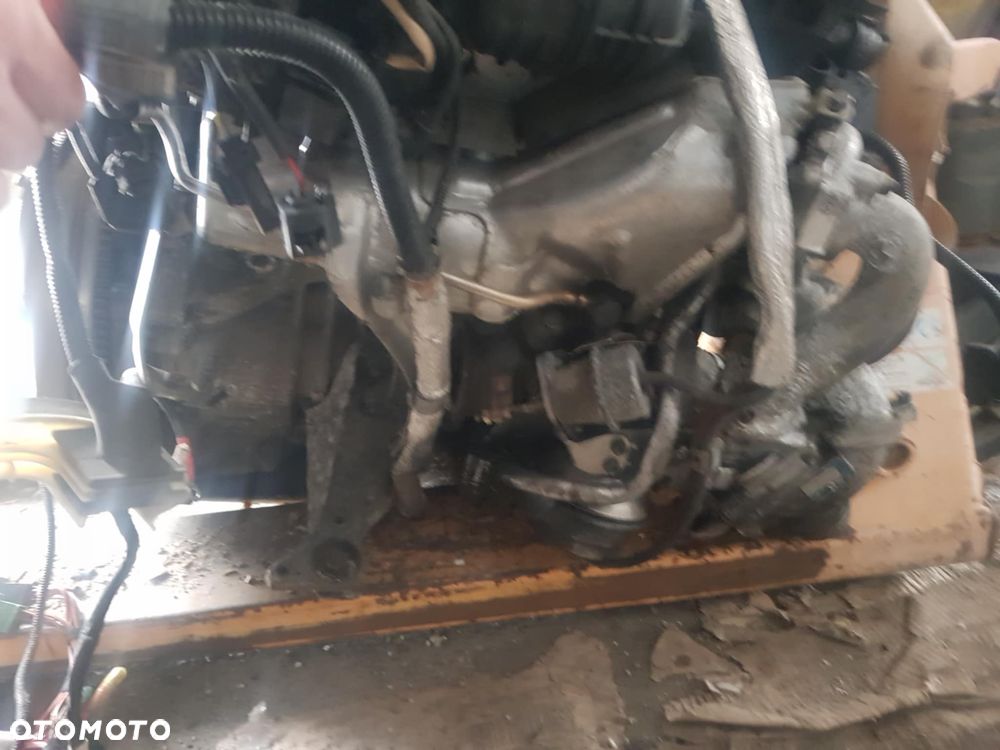 SILNIK BMW E81 E87 BITURBO N47D20D - 4