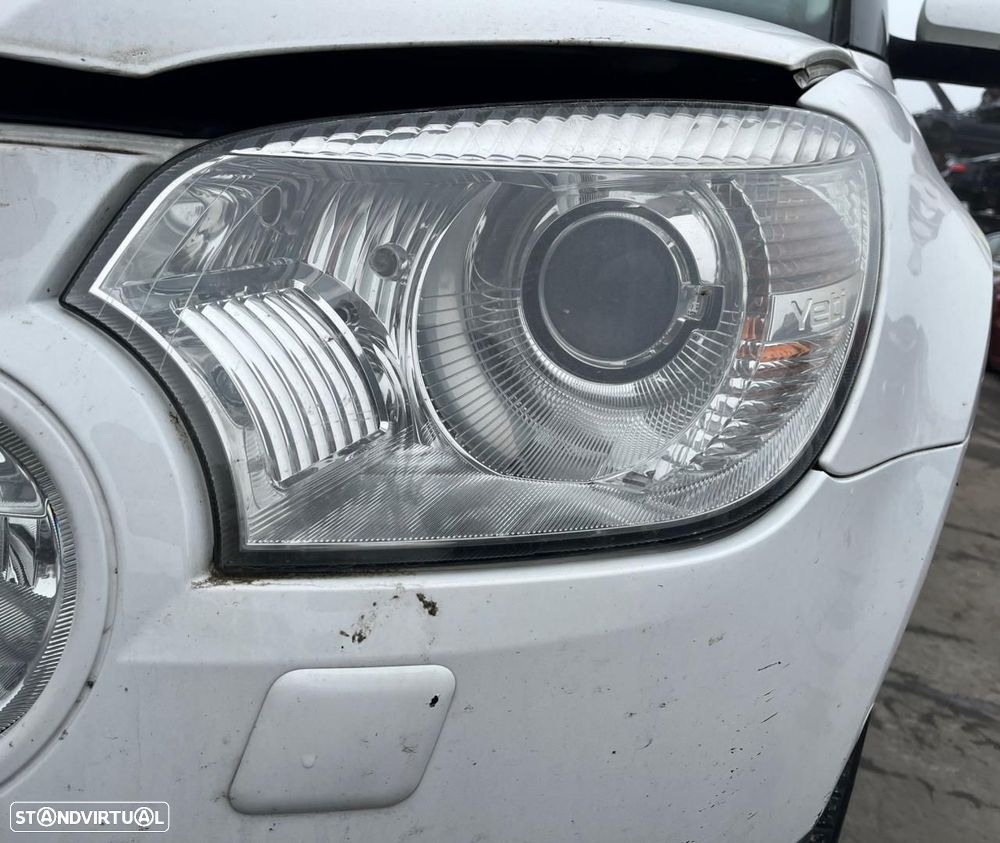 FAROL ESQUERDO SKODA YETI 5L2009 - 1
