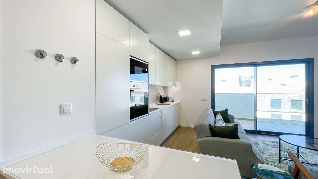 Apartamento T2 Moderno com Vista Mar e Piscina no Rooftop em Faro - Grande imagem: 2/28