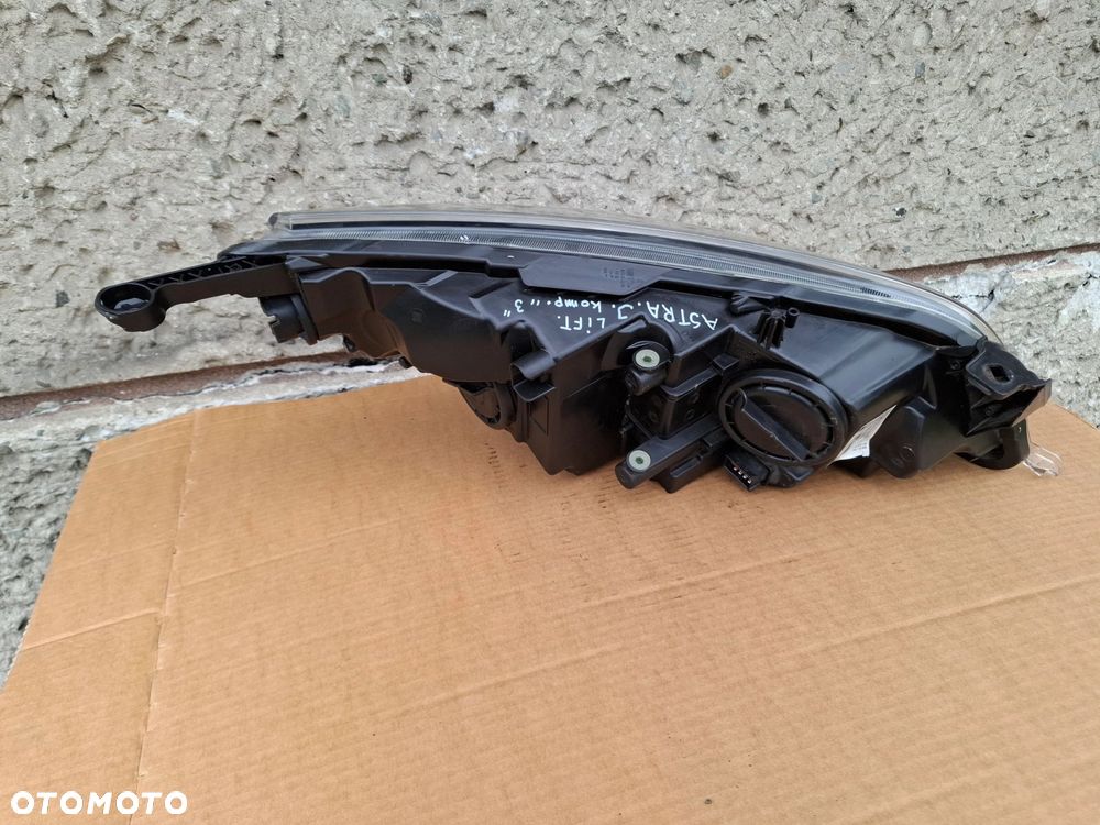 LAMPA PRZEDNIA LEWA OPEL ASTRA IV J LIFT - 9