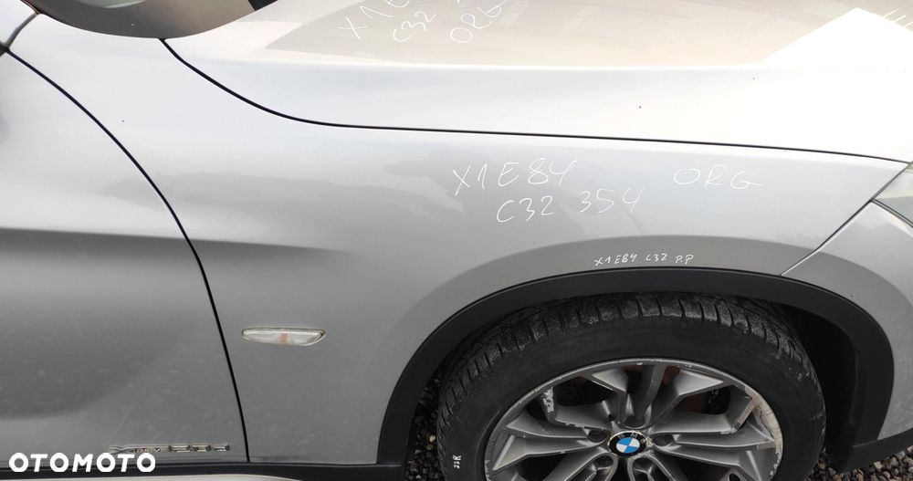 BŁOTNIK PRAWY PRZÓD PRZEDNI BMW X1 E84 354 TITANSILBER