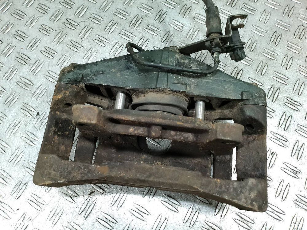 ZACISK HAMULCOWY LEWY PRZÓD AUDI A6 C6 3.2 V6 FSI - 3