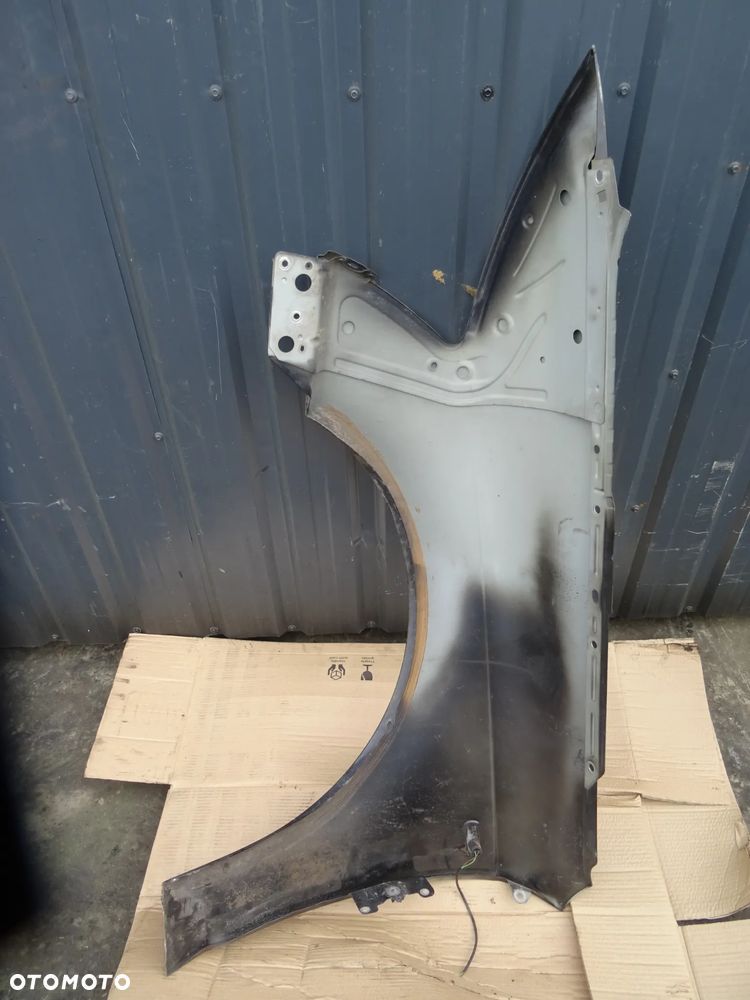 Audi A6C6 (LZ9Y) błotnik prawy przód - 4