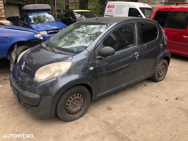 Dezmembrez Citroen C1 gri 1.0 benzina AC 2006 4 usi